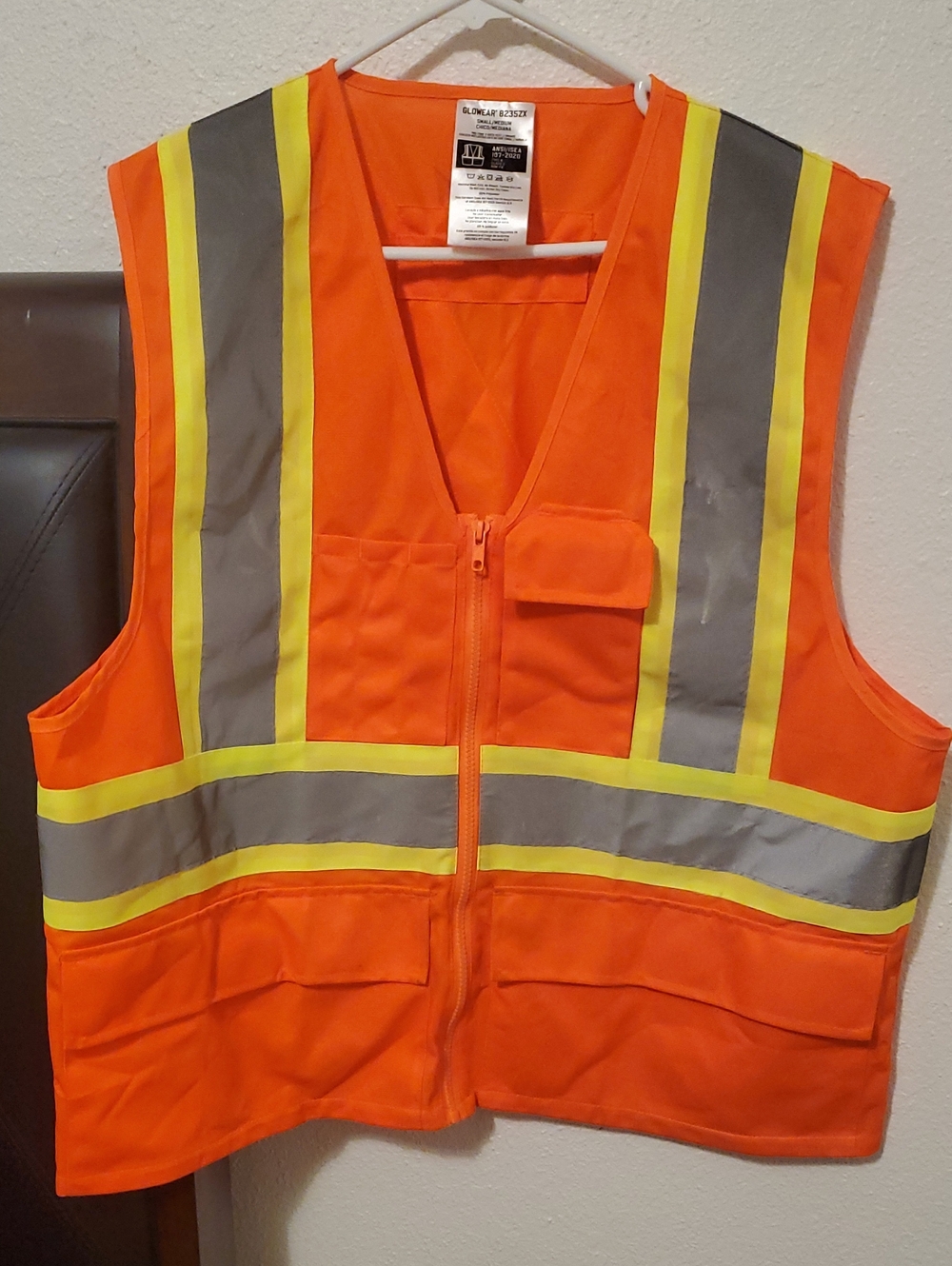 High-Visibility Orange Safety Vest with Reflective Stripes